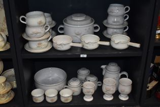 A collection of Denby stoneware, having pale grey ground with pink and pale green floral pattern,