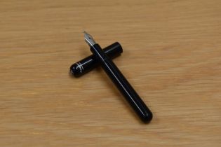 A Kaweco Lilliput cartridge fill fountain pen in black having Kaweco Germany since 1883 M nib.