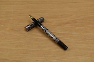 A boxed Waterman Ideal 452 1/2 lever fill fountain pen in BHR having sterling silver filigree