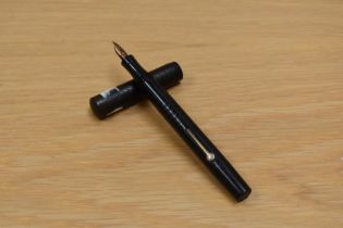 A John Bull lever fill fountain pen in chased BHR having warranted 14ct nib.
