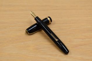 A Conway Stewart 84 lever fill fountain pen in black having Conway Stewart 14ct gold nib.