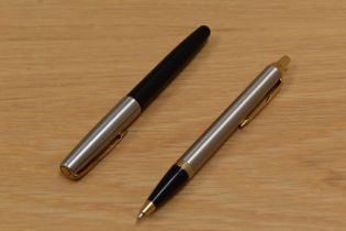A Parker Frontier Flighter cartridge fill fountain pen and ballpoint pen set in black with brushed