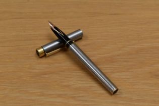 A Sheaffer Targa 1001 XG cartridge fill fountain pen in brushed chrome having Sheaffer 14K 585 nib.