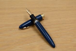 A Sheaffer Tuck Away plunger fill fountain pen in blue having Sheaffer made in USA 14K nib and