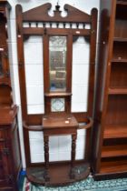 A Victorian mahogany hall stand having mirror and tiled back, width approx. 83cm