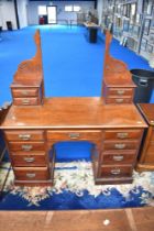 A Victorian mahogany dressing table in the aesthetic style. With approx 122cm.