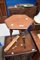 A Victorian and later hexagonal stool having triple turned legs.