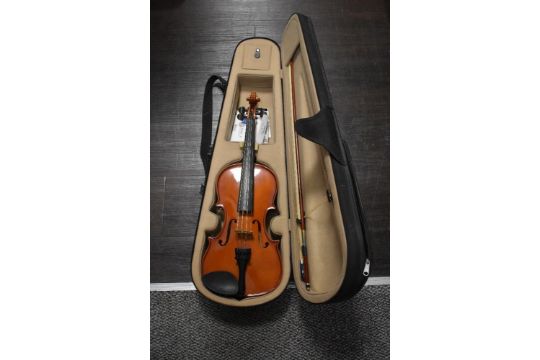 A modern violin, labelled Max Bruch Stradivarius copy, with case and bow