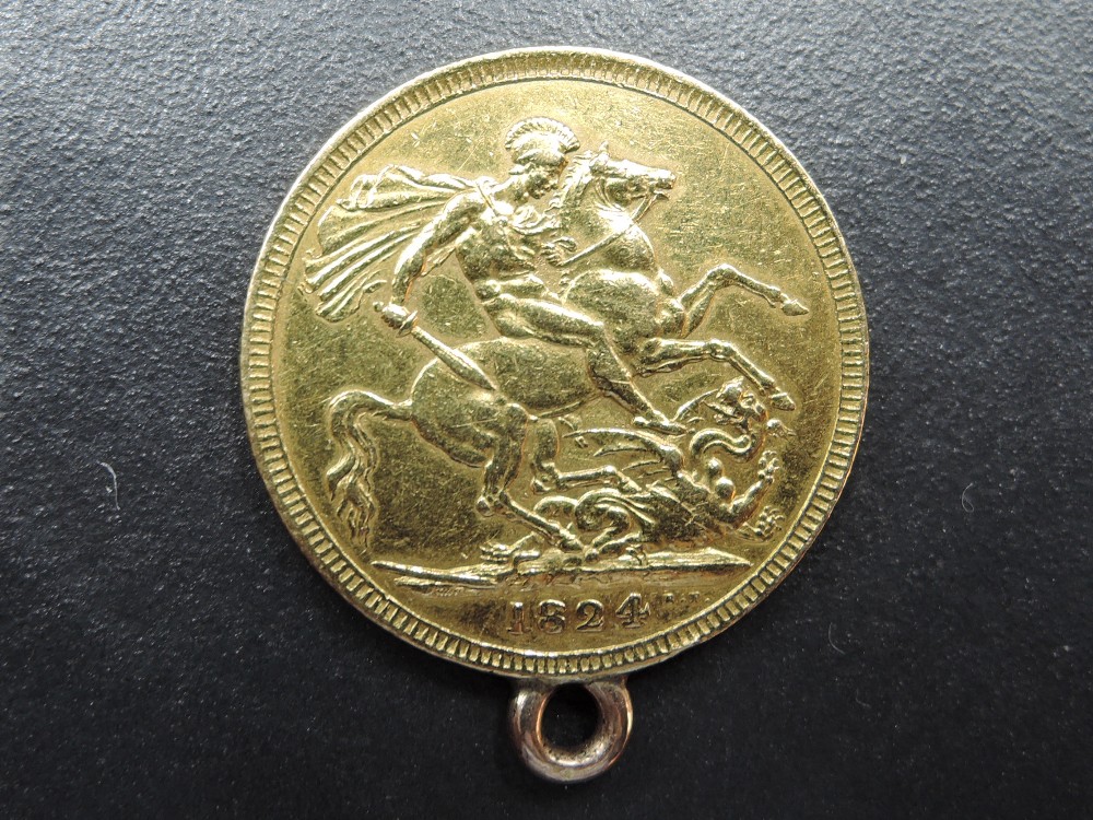 A 1824 George III Gold Sovereign, George & Dragon, Royal Mint, having metal loop fitted