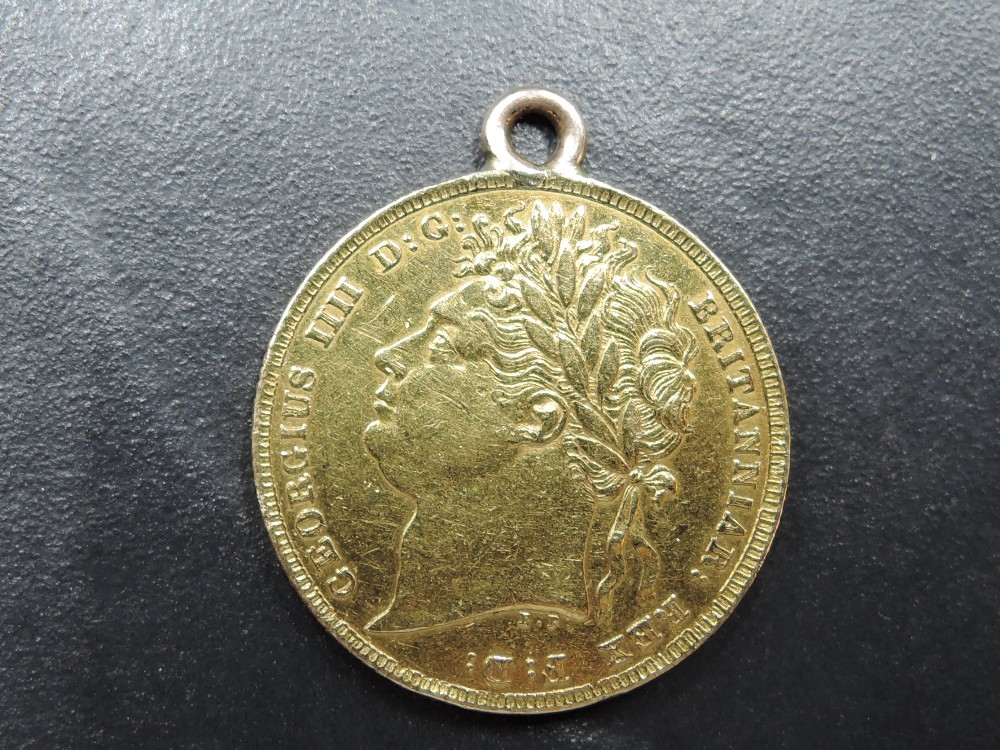 A 1824 George III Gold Sovereign, George & Dragon, Royal Mint, having metal loop fitted - Image 2 of 2