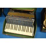 A vintage Toffoli & Fiorani Piano accordion, with case