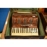 A vintage Victoria Castelfidardo piano accordion , in case
