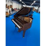 A modern opus baby grand piano