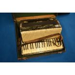 A vintage Hohner Verdi III B piano accordion , in case