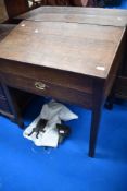 A period oak clerks desk, width approx. 78cm