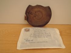 A wooden Cartridge Case Lid made from the Wreckage of Royal Navy 1st Invincible, sunk on the