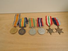 A WWI Medal Pair, War & Victory both to 201753 PTE.G.UPTON.Lan.Fus along with four WWII Medals,