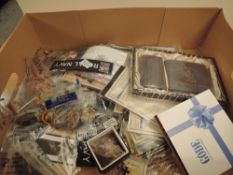 A large collection of Reproduction and Genuine Military Badges, Cloth Patches, Buckles etc including