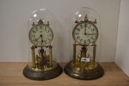 A mid-20th Century Kundo Anniversary Clock, the enamelled foliate patterned and Arabic dial above