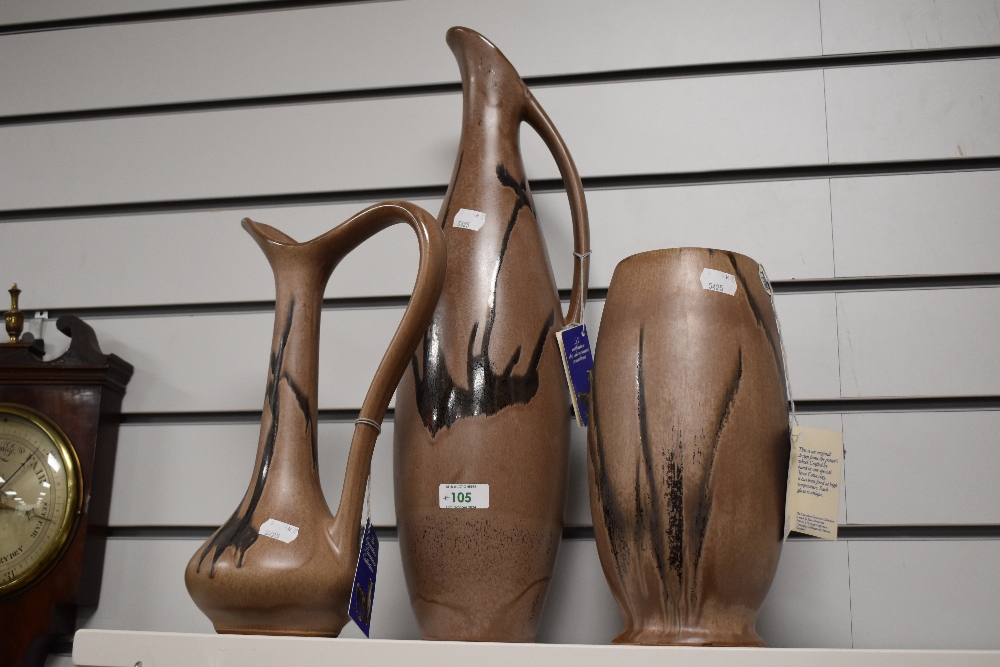 A Blue Mountain pottery footed vase, of ovoid form with drip glaze design, measuring 28cm high,