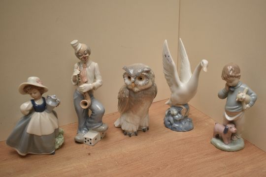 Four Nao by Lladro figurines comprising 'Short Eared Owl' number 712, 'Someone is Calling You' - Image 1 of 2