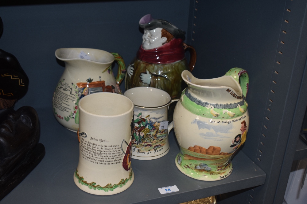 A Victorian Staffordshire pottery 'Auld Lang Syne' musical jug, measuring 18cm high, together with a