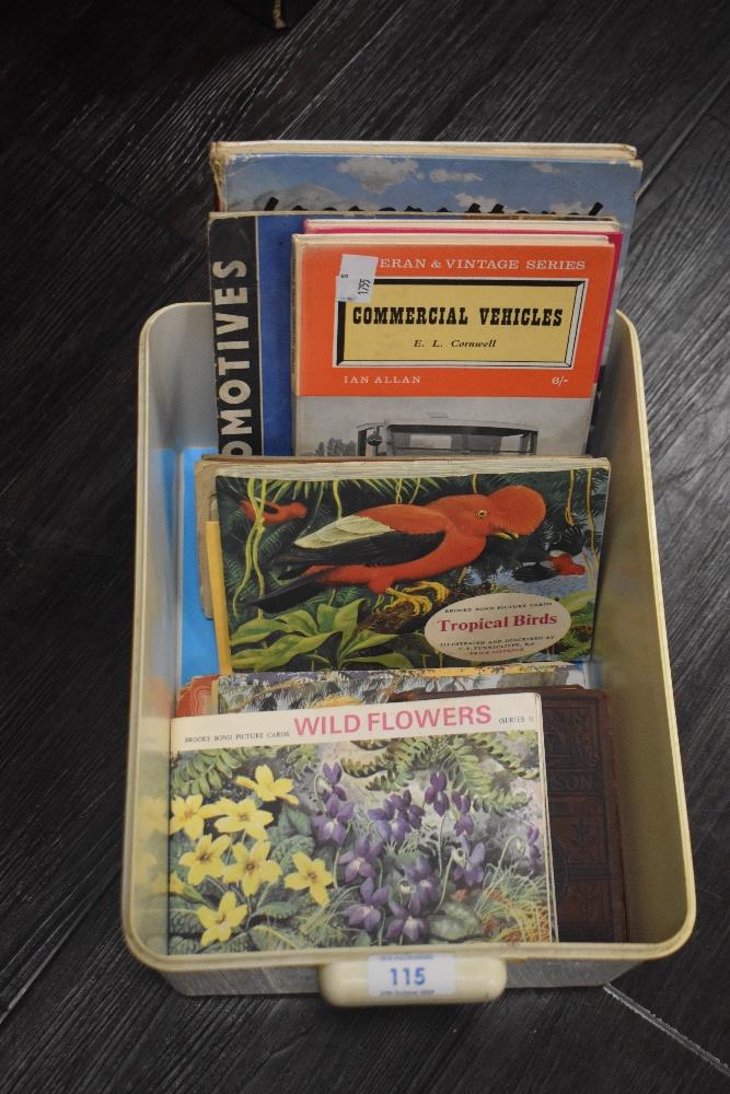 A selection of vintage reading material and Brooke Bond picture cards, to include Veteran &