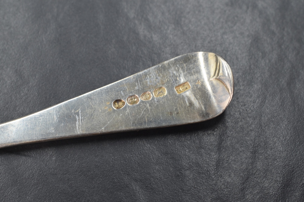 A pair of George IV silver berry spoons, of traditional form having embossed decoration to the - Image 3 of 3
