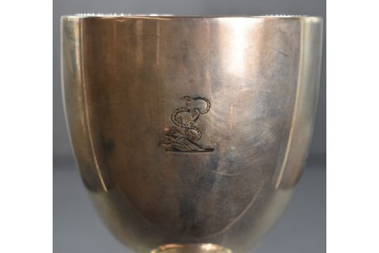 A Victorian silver cup, of traditional form having an engraved heraldic crest to the body, raised on - Image 2 of 3