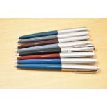 Eight Parker 51 ballpoint pens in black, two teal, grey, navy grey,green, brown and burgundy all