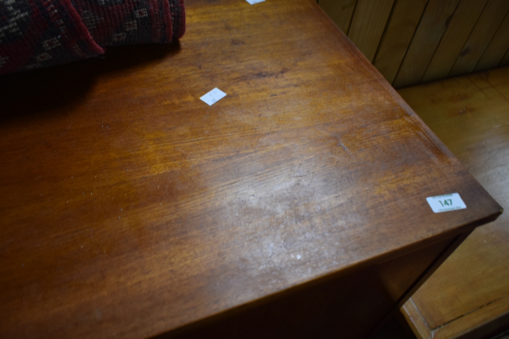 A vintage teak sideboard having three central drawers, flanked by cupboards, width approx. 179cm - Image 2 of 3