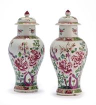 A PAIR OF CHINESE FAMILLE-ROSE BALUSTER VASES AND COVERS,