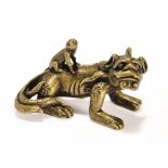 A CHINESE BRONZE 'KYLIN AND MONKEY' SCROLL WEIGHT, QING DYNASTY