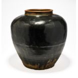 A CHINESE BLACK-GLAZED STONEWARE LOBED JAR, PROBABLY MING DYNASTY, 16TH/17TH CENTURY