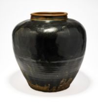 A CHINESE BLACK-GLAZED STONEWARE LOBED JAR, PROBABLY MING DYNASTY, 16TH/17TH CENTURY