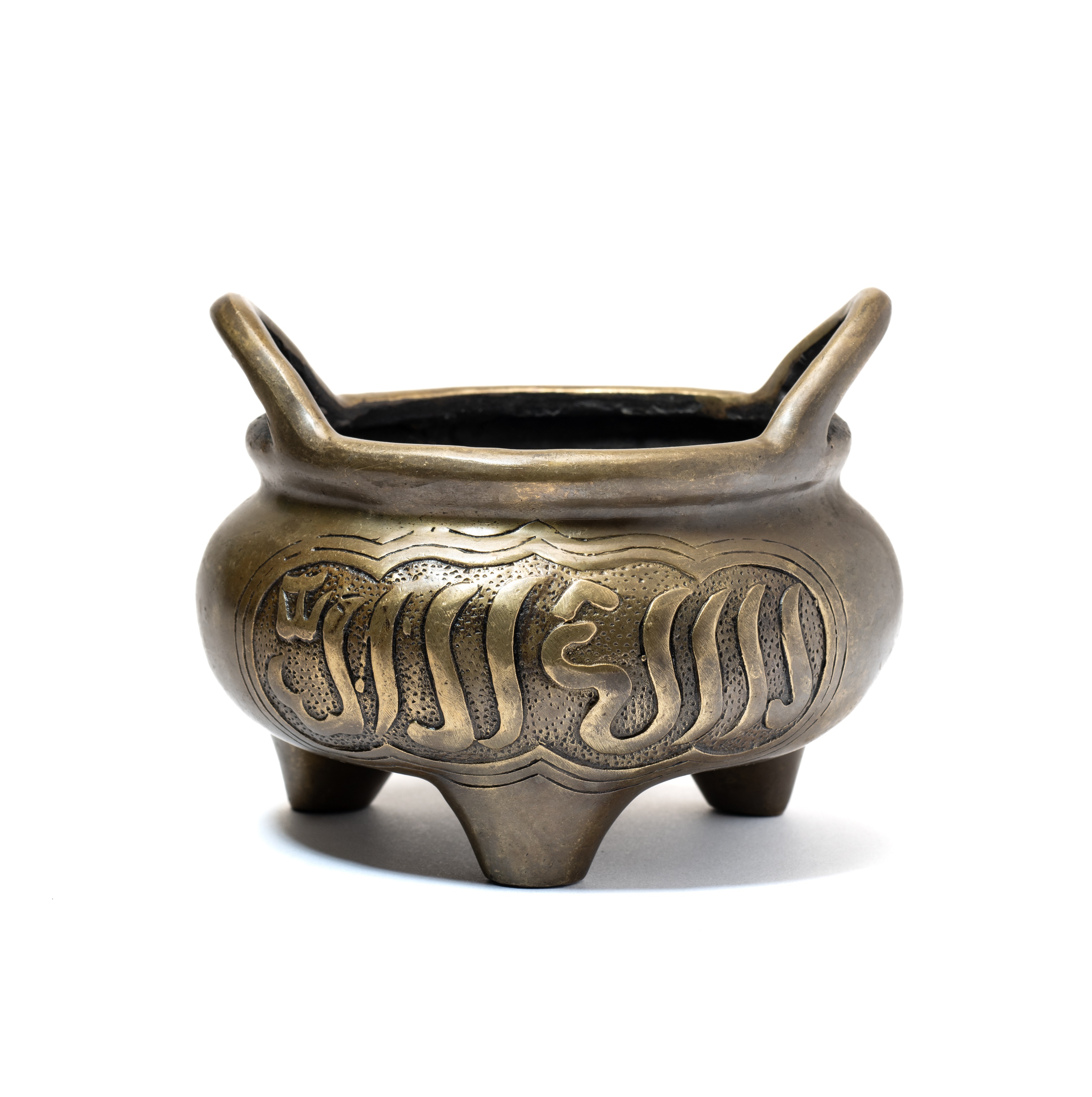 A CHINESE BRONZE TRIPOD CENSER FOR THE ISLAMIC MARKET, QING DYNASTY, 18TH CENTURY
