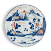 A CHINESE UNDERGLAZE-BLUE AND IRON-RED 'LANDSCAPE' PLATE, QING DYNASTY, QIANLONG PERIOD (1736-95)