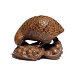 TWO JAPANESE CARVED WOOD NETSUKE OF QUAIL, MEIJI PERIOD (1868-1912)