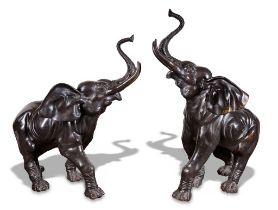 A LARGE AND IMPRESSIVE PAIR OF JAPANESE-STYLE BRONZE AFRICAN ELEPHANTS