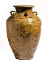 A CHINESE MARTABAN BROWN-GLAZED 'DRAGON' JAR, MING DYNASTY