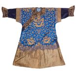 A CHINESE EMBROIDERED SILK ‘NINE DRAGON’ ROBE, JIFU, LATE QING DYNASTY, CIRCA 1900