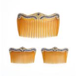 ˜ A SET OF THREE BELLE EPOQUE BLOND TORTOISESHELL, SAPPHIRE AND DIAMOND HAIR COMBS, CIRCA 1910