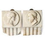 A PAIR OF GEORGE III STATUARY MARBLE FRAGMENTARY CORBELS, CIRCA 1800