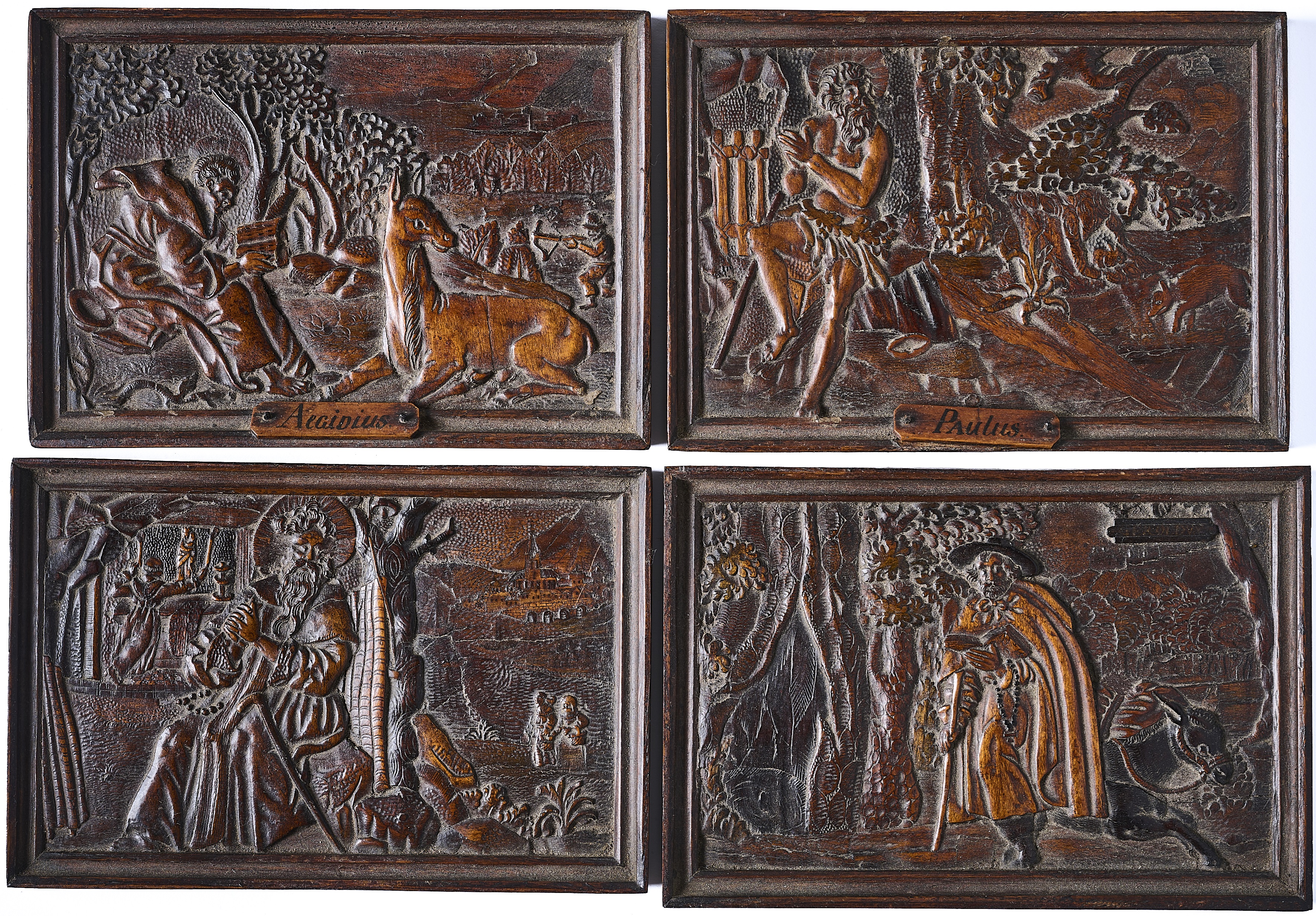 A GROUP OF FOUR WOOD RELIEF PANELS, PROBABLY BOHEMIAN, EGER, MID 17TH CENTURY