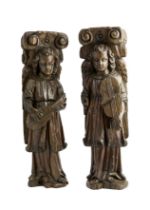 A PAIR OF OAK ARCHITECTURAL ELEMENTS CARVED AS ANGELS, FLEMISH, 17TH CENTURY