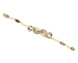 DIAMOND, SEED PEARL AND GOLD BRACELET, 1940s