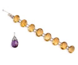 VICTORIAN SILVER AND CITRINE BRACELET, 1867 AND AMETHYST PENDANT, 1930s