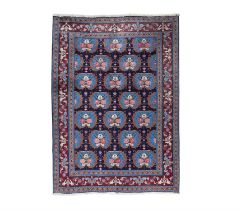 A TABRIZ BLUE GROUND WOOL CARPET. 274 X 204CM the central rectangular field with repeating