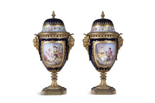 A PAIR OF FRENCH SEVRES STYLE PORCELAIN CASSOLETTES, 19TH CENTURY of ovoid form,