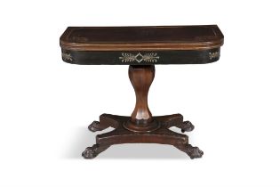 A REGENCY AND EBONISED AND GILT DECORATED FOLD-OVER GAMES TABLE the top with scrollwork carving,